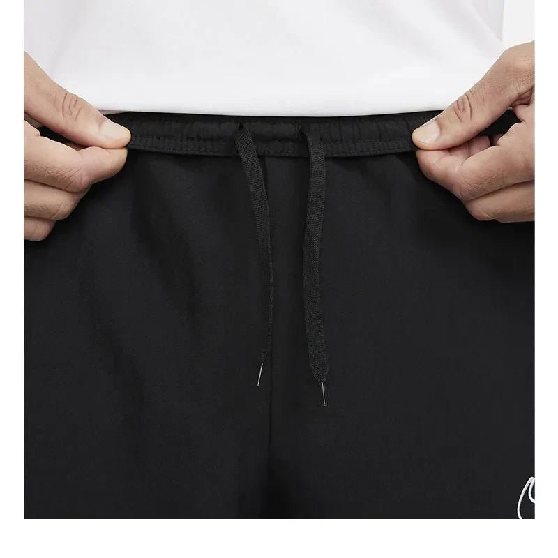 M NK DF ACD23 TRK PANT WP BR - Runner